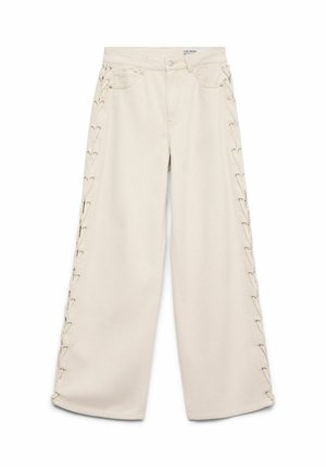 Pantalon beige à jambes larges avec des détails à lacets courant verticalement le long des deux côtés extérieurs et un design classique à cinq poches.