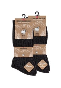 Due paia di calze lavorate a maglia grigio scuro etichettate "Norweger Socken," taglia 39-42, realizzate in lana di pecora, con suole soffici e illustrazioni di montagne e alberi.