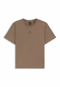 T-shirt in cotone marrone con maniche corte, colletto a girocollo ribbed e un piccolo logo ricamato sul petto. Tessuto liscio e vestibilità regolare.