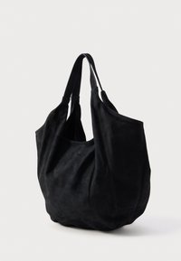 Sac cabas en daim noir avec deux poignées robustes, texture douce et silhouette décontractée. Dispose d'une ouverture spacieuse pour un accès facile.