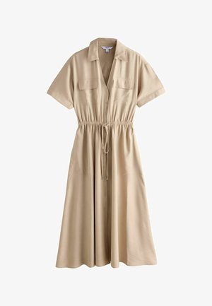 Bēša īss piedurkņu vidēja garuma kleita ar apkakli, krūšu kabatām, priekšējām pogām un regulējamu jostu ar auklu.