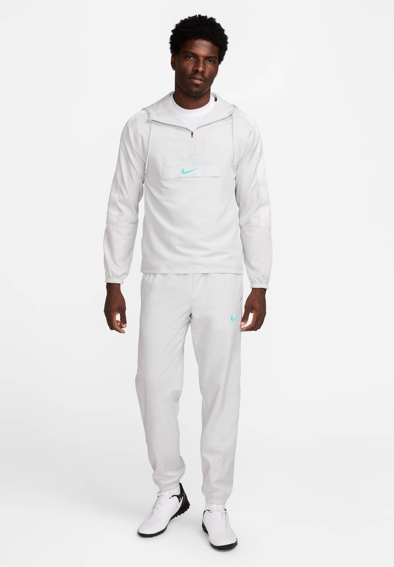 Nike Performance Trainingsvest lichtgrijs Nike Performance Trainingsvest lichtgrijs