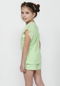 Koroshi Linne - lima lime green