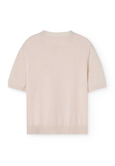 Suéter de punto de manga corta en un beige claro, con un escote y dobladillo acanalados, que muestra una textura suave y lisa y un diseño minimalista.