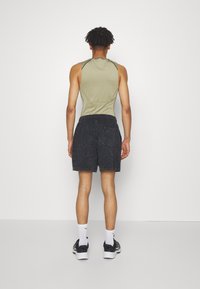 Nike Performance Šortky - black