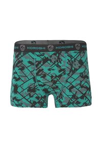 Herrenshorts in Türkis mit schwarzen und grauen abstrakten Mustern. Elastischer Bund mit "KOROSHI"-Logo und Totenkopfdesign. Baumwollmischgewebe.