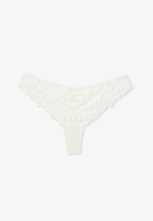 Perizoma da donna in pizzo bianco con motivo floreale, bordi smerlati e pannello frontale in tessuto liscio.