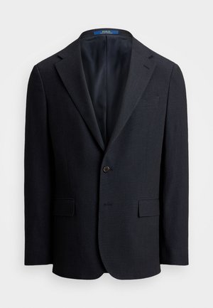 Blazer navy realizzato in tessuto testurizzato, con chiusura a bottone singolo, rever a lancia e due tasche frontali. Interno foderato.