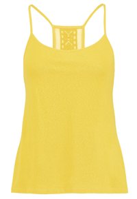 Gul linne med tunna axelband, har en texturerad bakdesign och mjukt tyg. Rakt nederkant avslutar den avslappnade silhuetten.