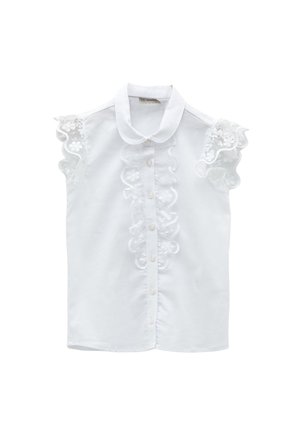 Hvid ærmeløs bluse med flæser i blomstret blonder på skuldrene, knaplukning foran og en rundet krave.