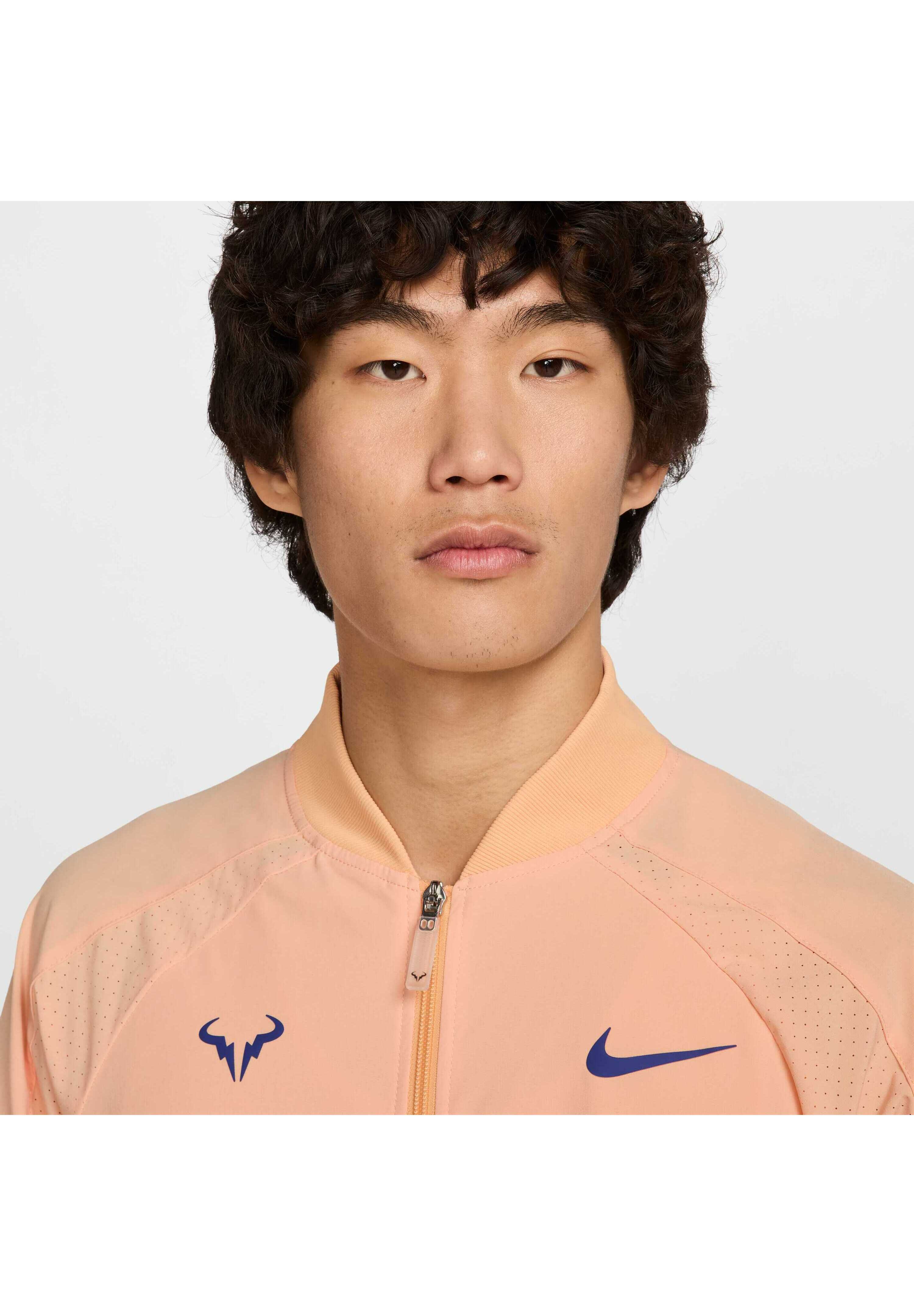 Nike Performance DRI-FIT RAFA - Training jacket - orange chalk