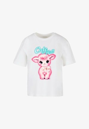 Hvid bomulds t-shirt med et pink cartoon kaninmotiv med store øjne, en sløjfe, og teksten "Cute as Hell" i turkis.
