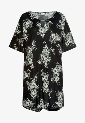Musta lyhythihainen tunika, jossa on valkoista ja harmaata kukkakuviota, pyöreä pääntie ja pieni metallinen koristekappale keskellä edessä.