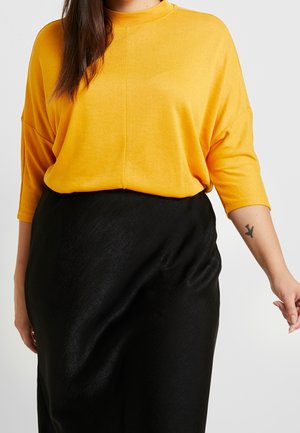 Striktrøje - yellow