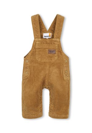 Salopette en velours côtelé marron pour tout-petits avec poche avant et bretelles réglables, avec étiquette de la marque Timberland.