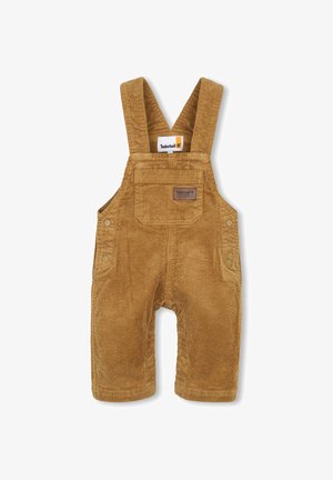 Bruine corduroy peuter-overalls met voorzak en verstelbare schouderbanden, voorzien van Timberland-merklabel.