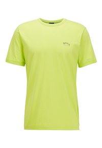 Lime green crew neck T-shirt made of soft cotton, featuring a small black "BOSS" logo on the left chest area and short sleeves.