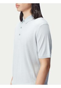 GOBI Cashmere Piké - mottled light grey