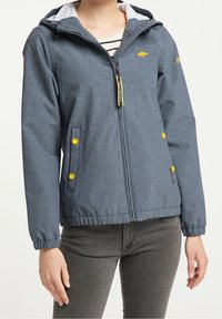 Grå, lätt jacka med huva. Har gula detaljer på fickor och dragkedja. Slät textur, avslappnad design, elastiska ärmslut.