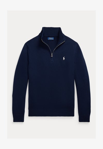 Pull en maille bleu marine à fermeture éclair quart de zip, col, poignets et ourlet côtelés, avec un logo blanc Polo Ralph Lauren sur la poitrine gauche.