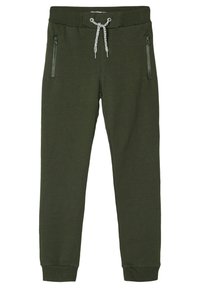 Pantalons de jogging verts en tissu doux, avec une taille élastique, un cordon de serrage et deux poches latérales zippées.