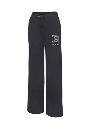 Schwarze Sweatpants mit weitem Bein, Kordelzug an der Taille und weißem "B MCR'89"-Logo am linken Oberschenkel.