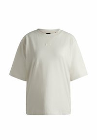 Crèmekleurig katoenen t-shirt met korte mouwen, een ronde hals en subtiele, gestructureerde letters "BOSS" op de voorkant. Glad, eentonig stof.