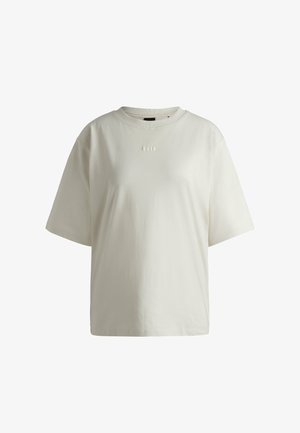 Cremefarvet bomulds t-shirt med korte ærmer, rund hals og subtil tekstureret skrift "BOSS" på forsiden. Glat, ensfarvet stof.