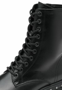 Tamaris Botines con plataforma - black