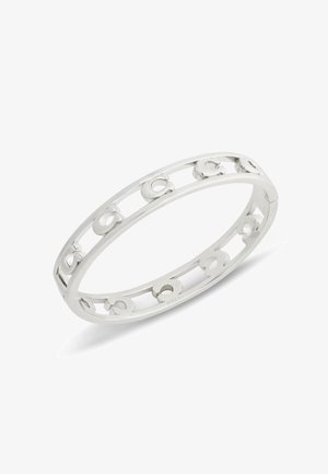 Silver metal bangle bracelet with cutout letter "C" pattern evenly spaced around the band on a white background.