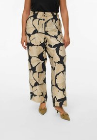 Wide-leg trousers made of fabric with cream floral patterns on a black background. Features an elastic waistband and a relaxed fit.