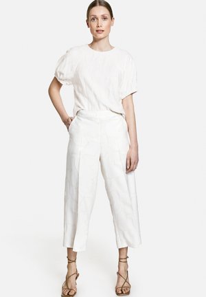 ELEGANTE CULOTTE - Spodnie materiałowe - offwhite gemustert