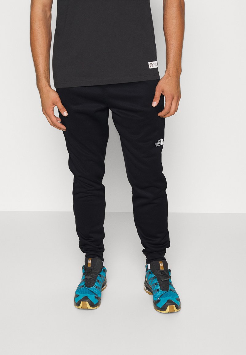 The North Face - REAXION JOGGER - Tracksuit bottoms - black, Enlarge