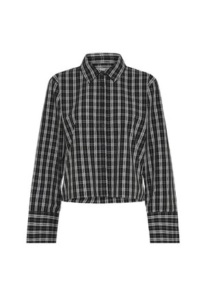 Dolga srajca z gumbom v črno-beli karo vzorcu, s klasičnim ovratnikom in prilegajočimi manšetami, prikazana na ravni površini na beli podlagi.