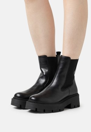 Platform ankle boots - black