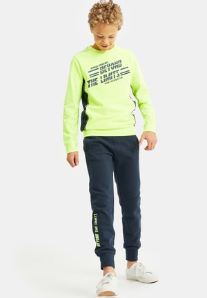 MET OPDRUK EN TAPEDETAIL - Maglietta a manica lunga - neon yellow