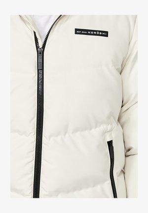 Koroshi Téli dzseki - crudo