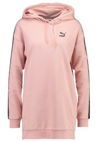 Rosa bomullshoodie med en framficka, dragsko i huven och svarta sidosträck. Har Puma-logotypen på vänster bröst.