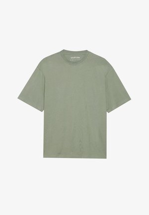 Grøn bomulds t-shirt med rund halsudskæring, korte ærmer og en afslappet pasform. Tekstureret stof med subtile lodrette linjer, uden mønstre eller detaljer.