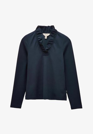 Navy long-sleeve top with a ruffled V-neckline, made from soft fabric. Features a straight cut and a small brand tag on the side.