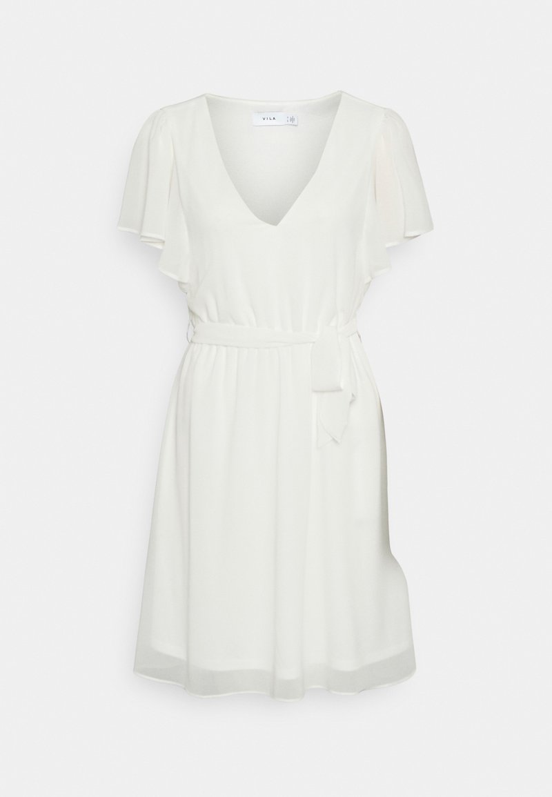 Vestido corto blanco con mangas acampanadas, escote en V, cintura ajustada con un lazo y falda fluida. Tejido ligero y suave.