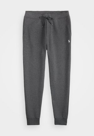 Gray jogger pants in soft fabric, featuring an elastic waistband with drawstring and cuffed ankles. Small logo on the left leg.