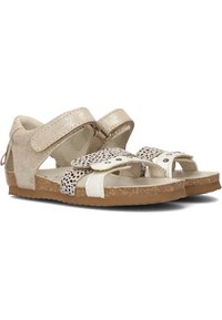 Beige sandalen met klittenbandsluitingen, glinsterend materiaal, witte accenten en een kurken buitenzool. Bevat geperforeerde details op de banden.
