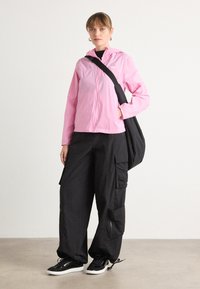 Tommy Jeans OUTDOOR JACKET - Summer jacket - carnival pink