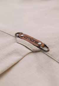 Unausgewählt, beige