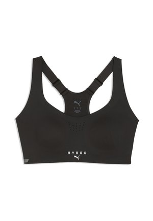 Czarny sportowy biustonosz z ramiączkami typu racerback, małymi otworami wentylacyjnymi z przodu oraz białymi logo Puma i HYROX poniżej klatki piersiowej.