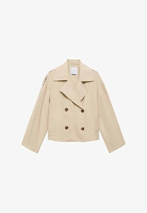 Beige dubbelknäppt jacka med bred krage, stora knappar och två framfickor. Mjuk tygkvalitet med kort och lös passform.