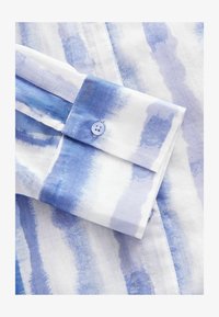 Unselected, blue tie dye