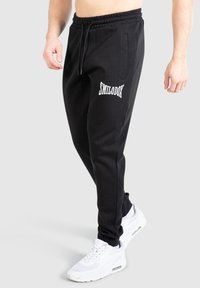 Smilodox Træningsbukser - schwarz