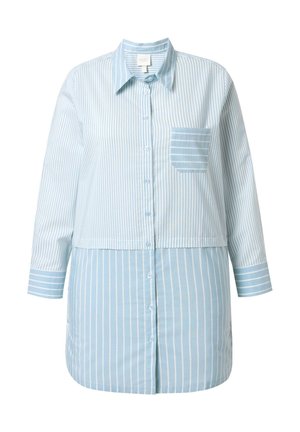 Modrá pruhovaná košile s dlouhými rukávy, zapínáním na knoflíky a náprsní kapsou s vodorovnými pruhy. Měkká látka s volnějším střihem.
